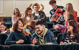 group cheerful happy students sitting lecture hall before lesson